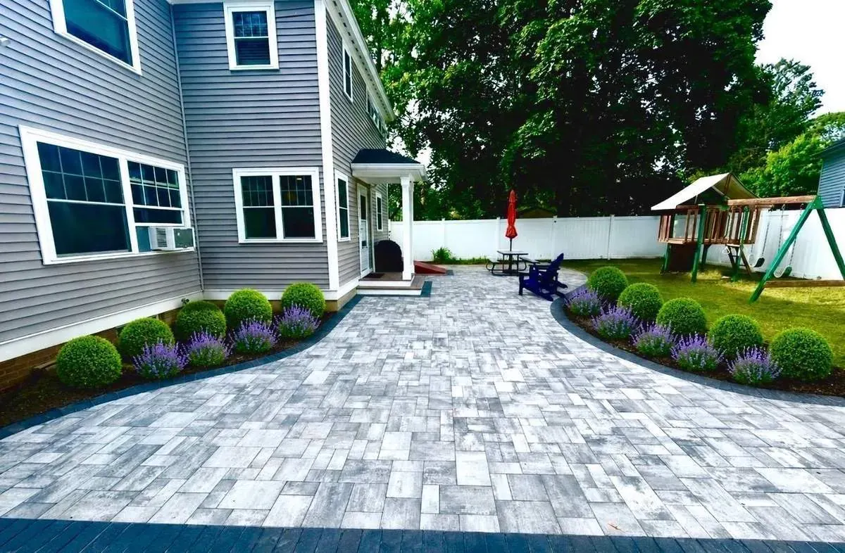 Paver patio and walkway with new plantings